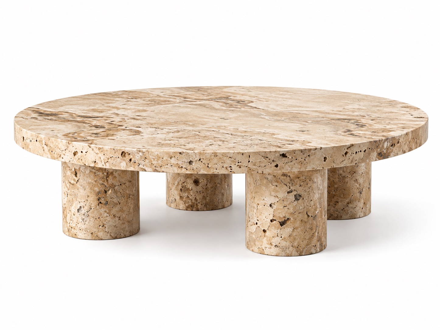 A round travertine coffee table on five cylindrical legs, cut from offcuts of a project's own stone specification.